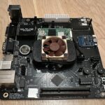 This is a photo of the ITX-Llama motherboard showing the AGP slot, System on Module, and top of the board.